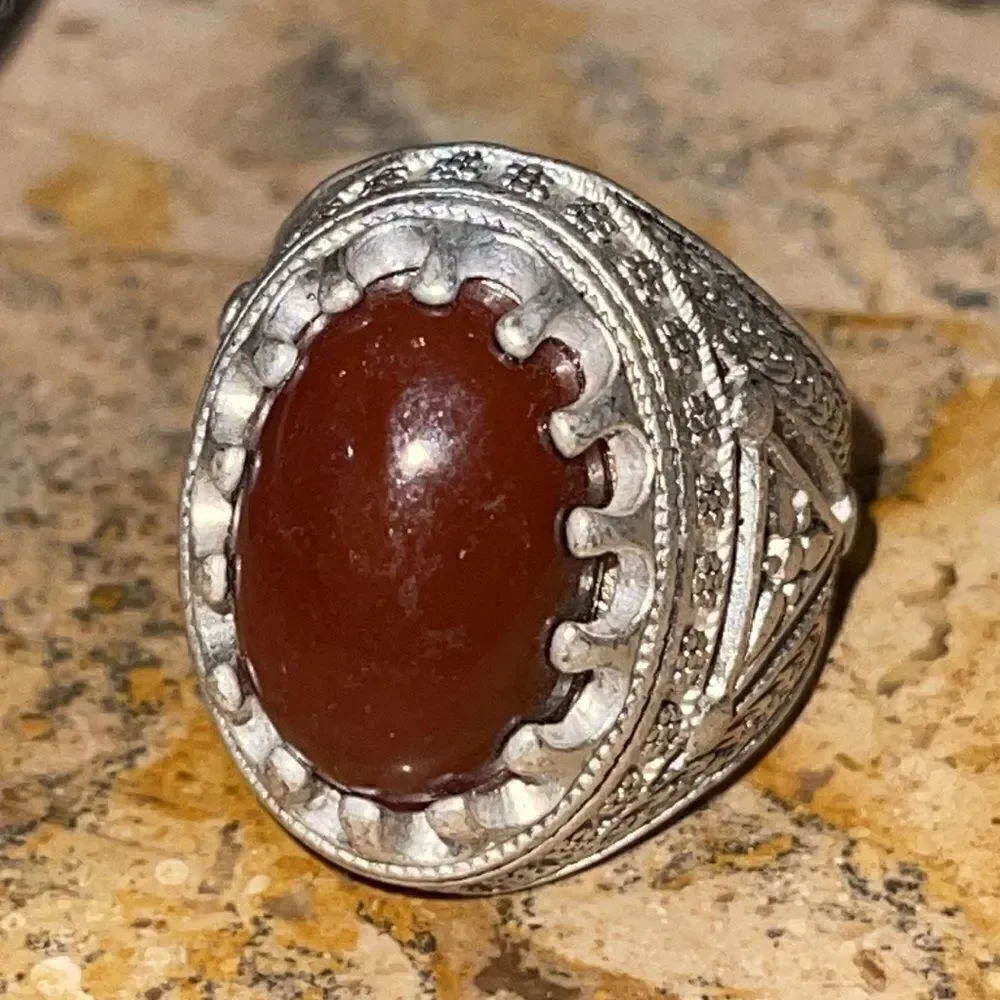 Costume jewelry silver tone ring with dark amber color center stone size9.5.